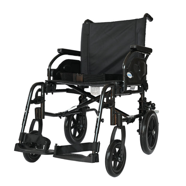 Forza Freedom 5000 (Transit) Premium Steel Wheelchair. The wheelchair features a strong steel frame in a dark gray finish with a comfortable black seat and backrest. It has large, solid rear wheels designed for easy transport by a caregiver, with push rims for manual assistance, and smaller front casters for smooth steering. The design includes fixed armrests, footrests, and a folding frame for convenient storage and transport, providing both durability and ease of use.